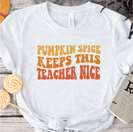 "Pumpkin Spice Keeps This Teacher Nice" Unisex Tee